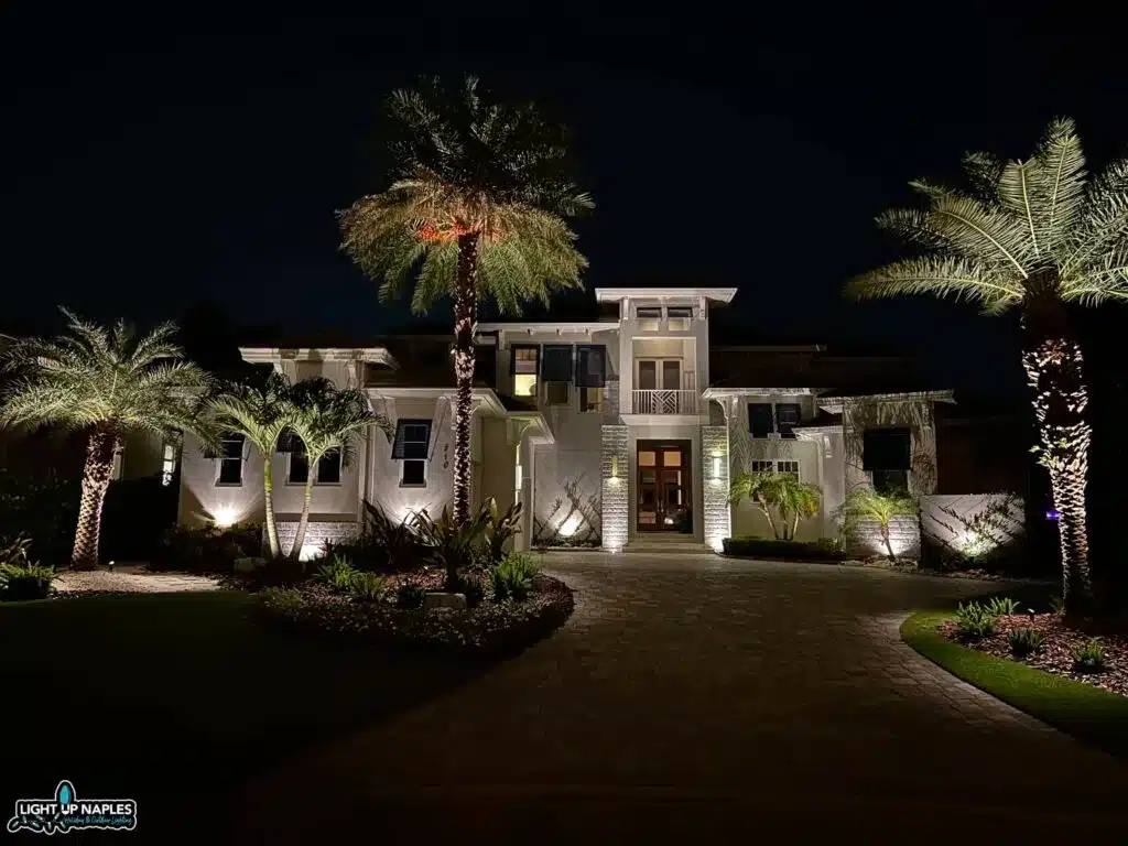 Light Up Naples low voltage landscape lighting with palm tree uplighting and architectural accent lights